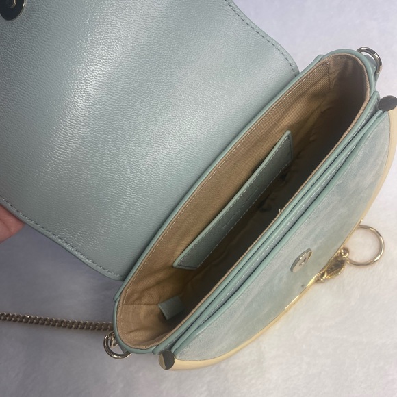 A high-shine bar adds definition to the half-circle silhouette of this elegant. - Picture 4 of 6